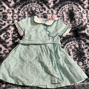 e American Girl Kit's green calico wrap birthday dress